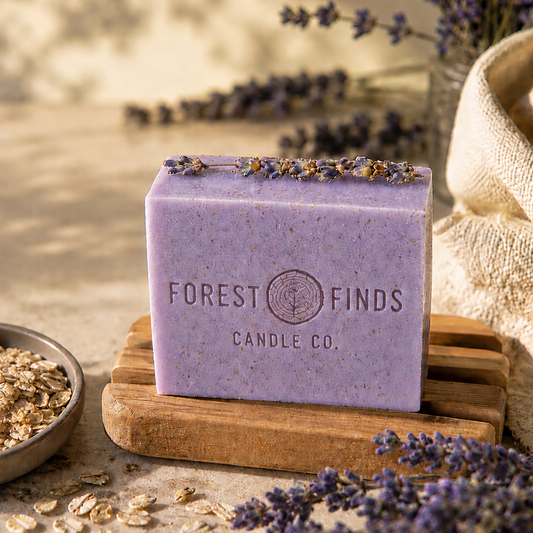 Purple soap bar on a wooden stand with lavender flowers and oats in the background